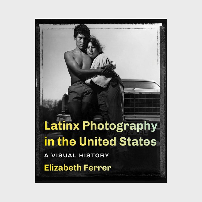 A shirtless man and woman embrace, standing before a car. Text: 
