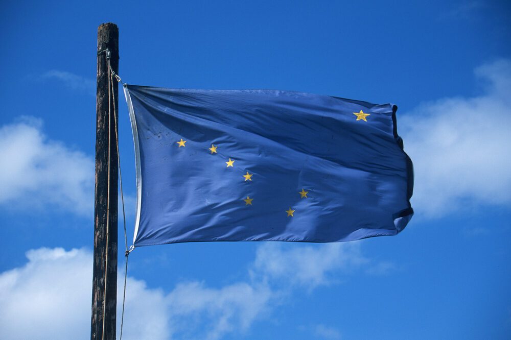 State Flag of Alaska against the sky