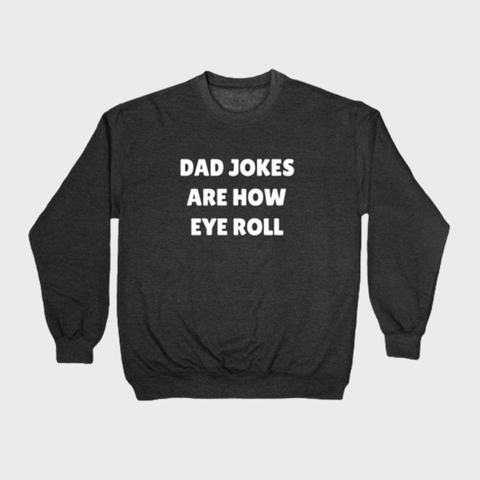 Dark sweatshirt displays text reading, 