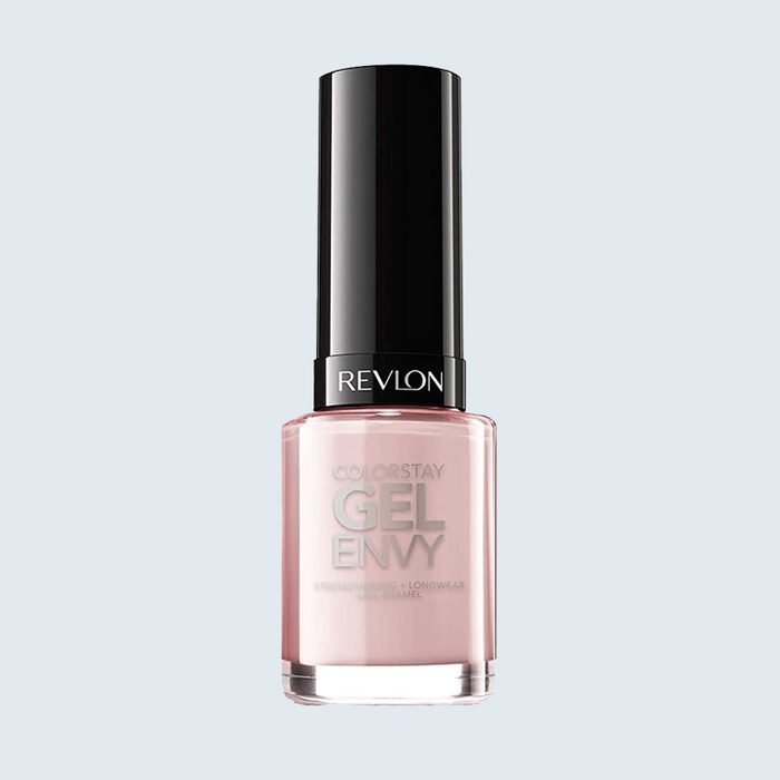 Nail polish bottle stands upright, labeled 