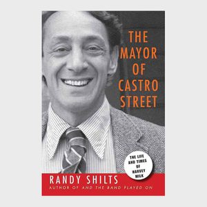 Black-and-white photograph of a smiling person occupies most of the book cover titled 