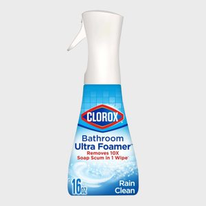 Bottle standing upright, labeled Clorox Bathroom Ultra Foamer, promising removal of soap scum, set against a plain background.
