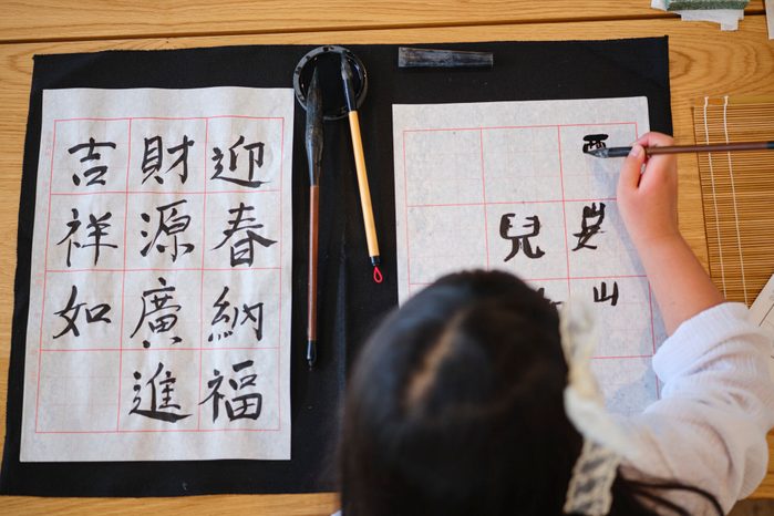 Young Chinese Family in Their Home